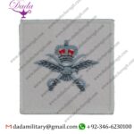 RAF PHYSICAL TRAINING INSTRUCTOR CROWN EAGLE SWORDS VEST BADGE ON WHITE QUEEN'S CROWN. EMBROIDERED AIR FORCE BRANCH BADGE